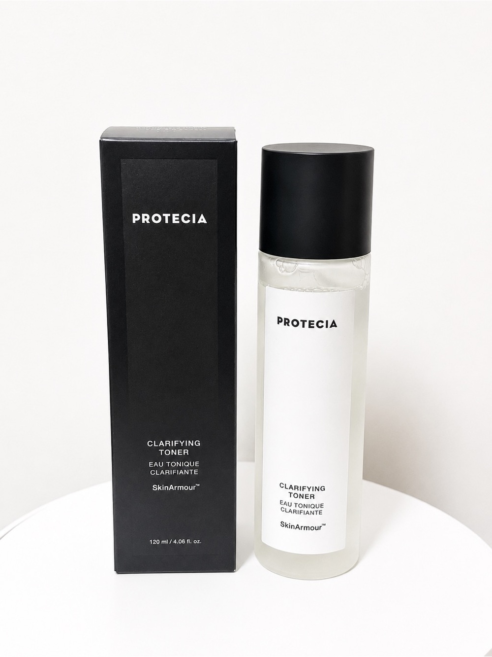 Protecia Clarifying Toner — Black & White